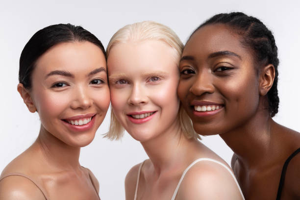 istock Three women smiling while thinking about women power 1141294363