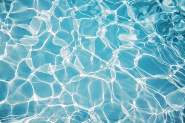 istock Hotel swimming pool with sunny reflections 1141296026