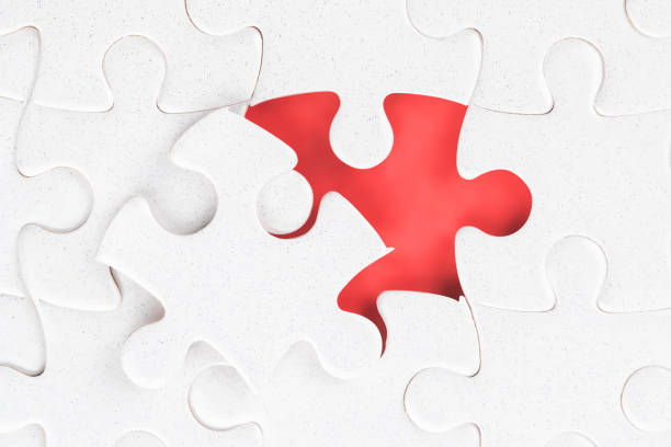 istock Jigsaw puzzle close up with last unfinished part 1141296095