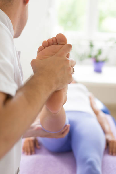 istock Young woman doing rehabilitation exercises 1141296169