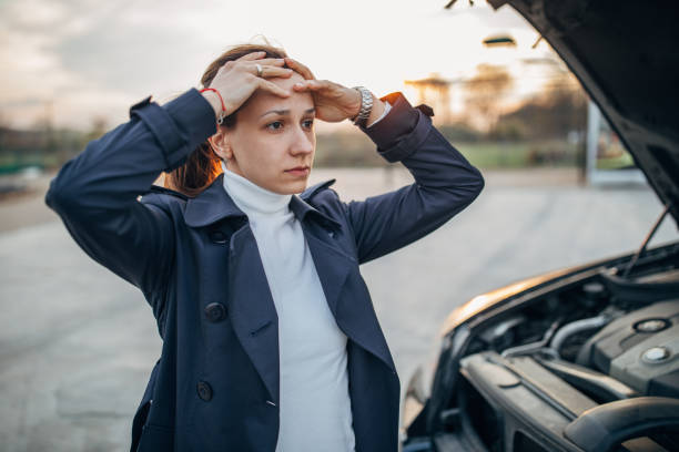 istock Woman is stressed because her car broke 1141296417