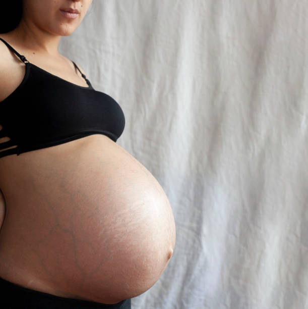 istock Pregnant woman. 9th Month of Pregnancy. Copy space 1141297607