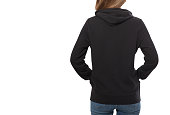 young girl in black sweatshirt, black hoodies rear view isolated on white background.