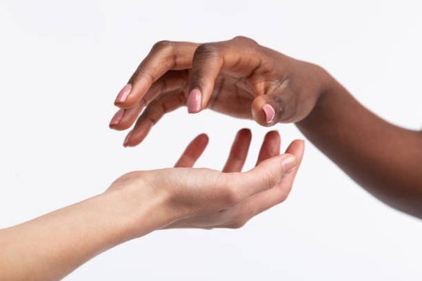 istock Women with different skin color posing using their hands 1141299428