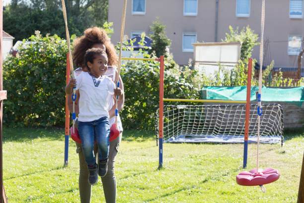 istock african mother with toddler boy on playground 1141299567