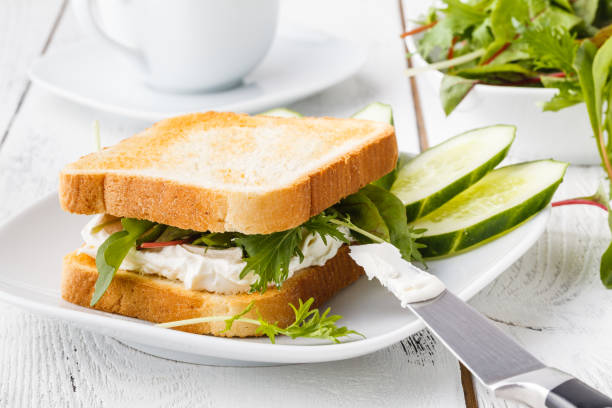 istock Diet healthy food. Bread with avacado, tomatoes and basil 1141302538