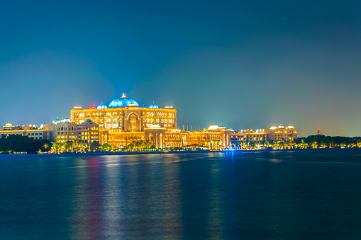 the Emirates palace in Abu Dhabi during sunset.