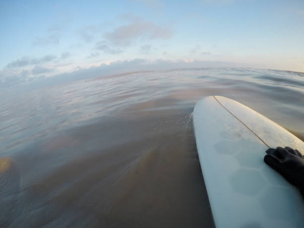 istock Surfers in polluted sea 1141303570