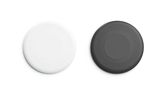 Blank black and white plastic frisbee mockup set, isolated, 3d rendering. Empty playing disc mock up, top view. Clear fall circle for leisure game template.