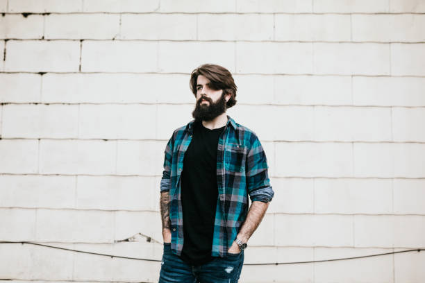 istock Portrait of Handsome Bearded Man By Building Wall 1141308880
