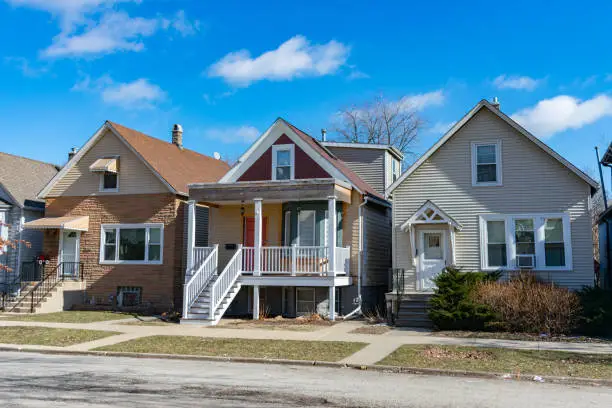 Photo of A Row of Three Wood Homes in Logan Square Chicago