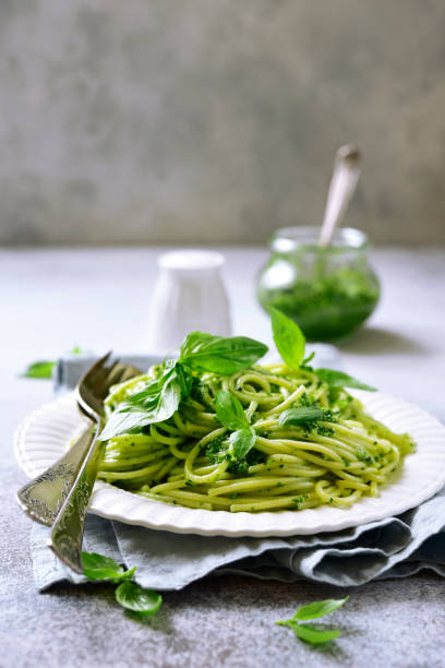 istock Traditional italian spaghetti with basil pesto sauce 1141309002