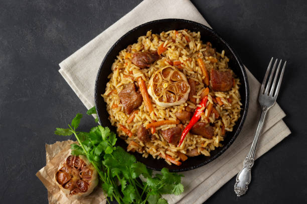 istock Uzbek pilaf or plov from meat 1141310052