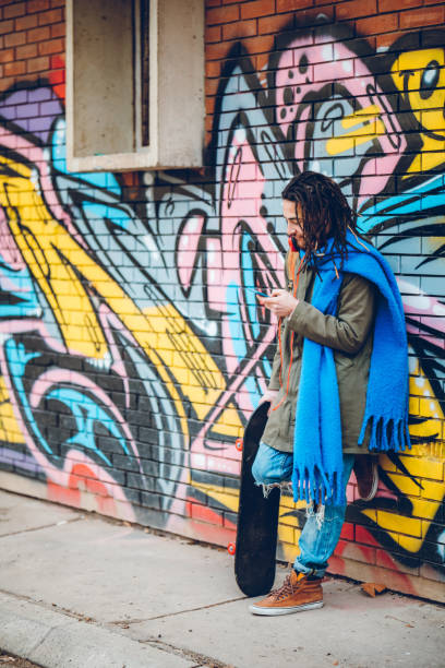 istock Young man with dreadlocks enjoys music 1141313840