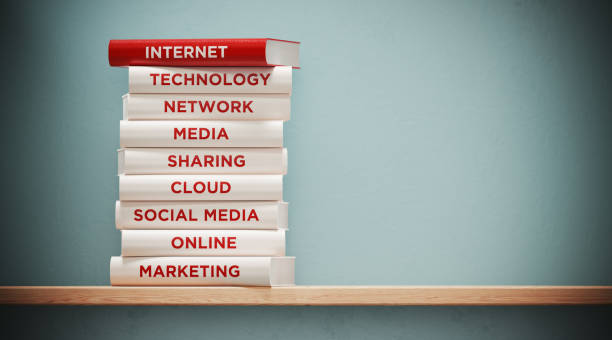 istock Books of  Internet And Marketing In Front Grey Wall 1141314021