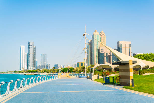 view of the corniche - promenade in abu dhabi, uae - skyscraper travel people traveling traditional culture imagens e fotografias de stock