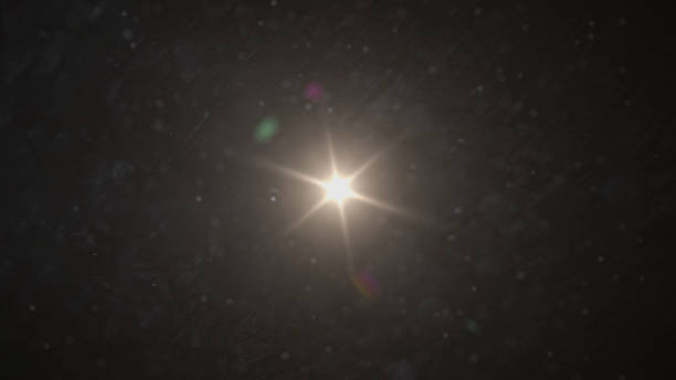 istock Real Lens Flare Shot in Studio over Black Background. Easy to add as Overlay or Screen Filter over Photos 1141316095