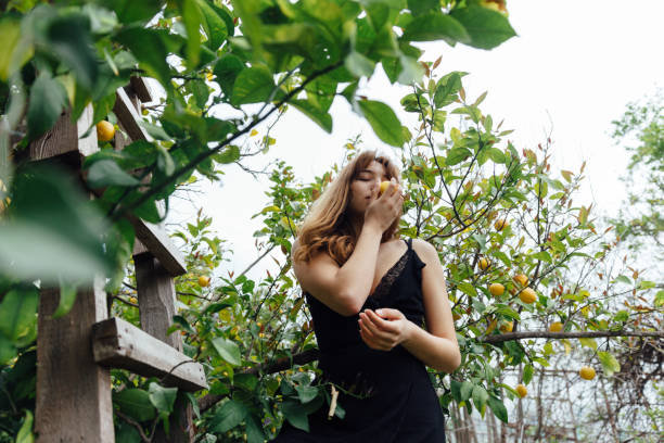 istock Teenager smelling lemon 1141319021