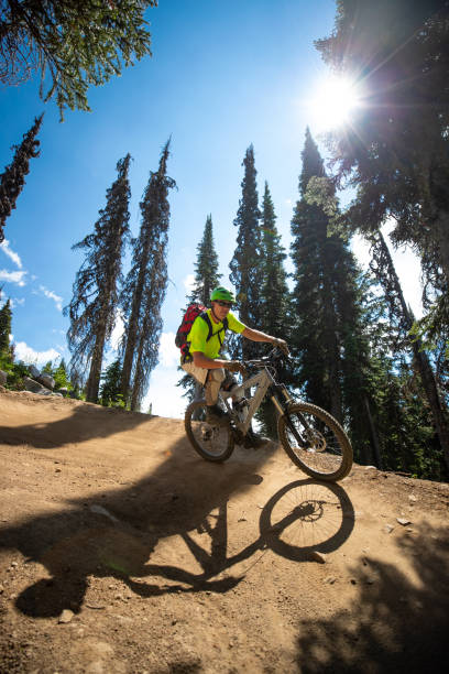 istock mountain biking at ski resort 1141319071