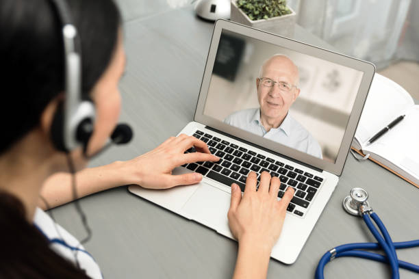 istock Doctor talking with a senior patient 1141320648