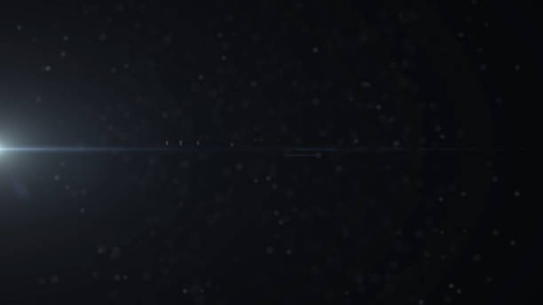 istock Real Lens Flare Shot in Studio over Black Background. Easy to add as Overlay or Screen Filter over Photos 1141324700