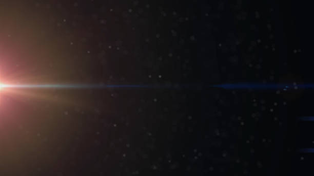 istock Real Lens Flare Shot in Studio over Black Background. Easy to add as Overlay or Screen Filter over Photos 1141324733