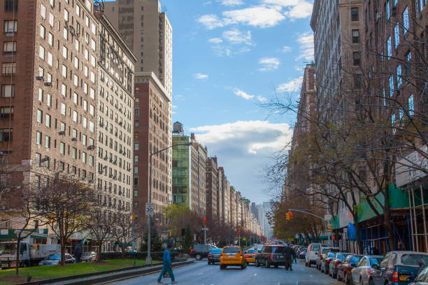 Manhattan's Park Avenue in the Fall as pedestrians go about their business.
