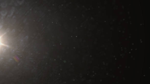 Real Lens Flare Shot in Studio over Black Background. Easy to add as Overlay or Screen Filter over Photos