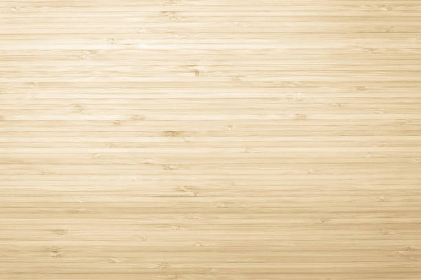 istock Bamboo natural wood texture pattern background in light yellow cream beige brown color 1141328959