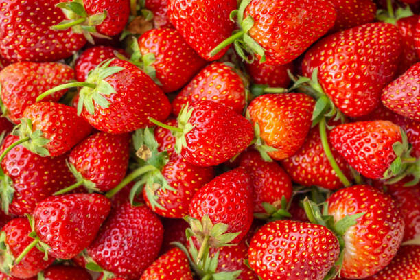 istock Fresh organic Strawberry fruit background Top view closeup 1141329095