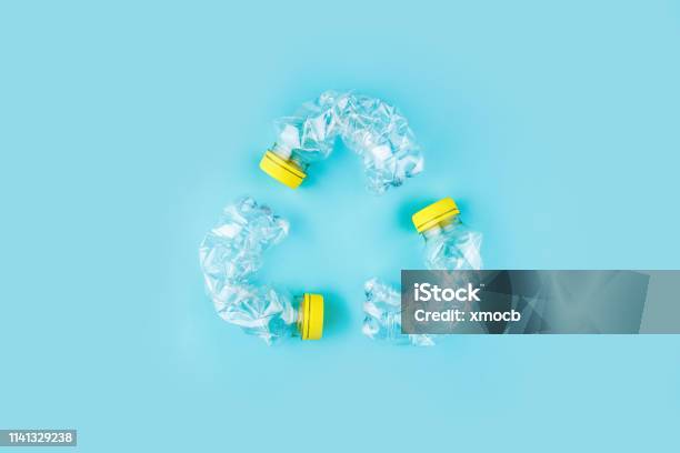 Three Crashed Plastic Bottles Stock Photo - Download Image Now - Recycling, Plastic, Bottle