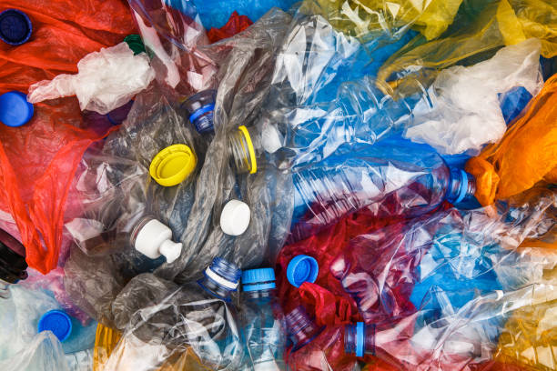 istock Multicolored plastic bottles, caps, bags messy garbage 1141329239