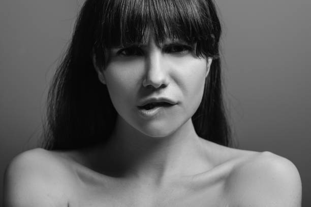 istock annoyed disturbed angry emotion lady portrait 1141329948