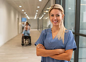 istock Beautiful latin american medical resident looking at camera smiling with arms crossed 1141330771