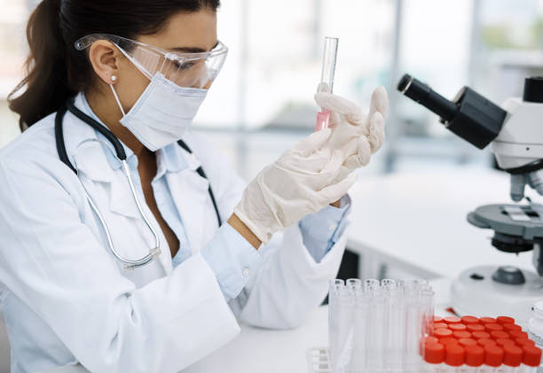 istock She's one experiment away from finding the cure 1141331017