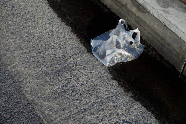 istock plastic bag garbage was dumped on the road 1141331057