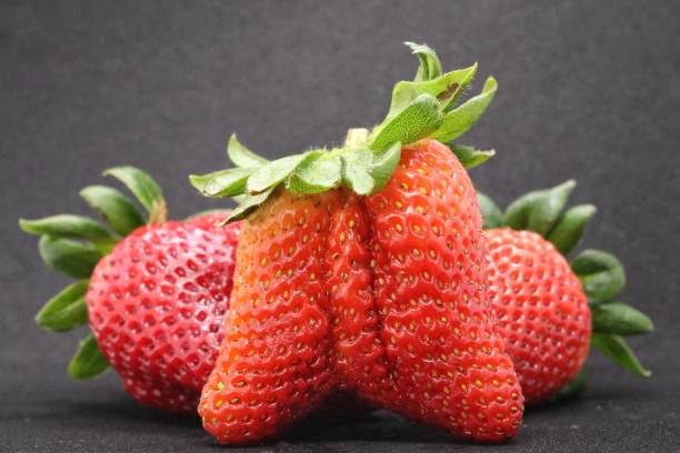 istock Sweet, fresh strawberry.  Black background. 1141334618