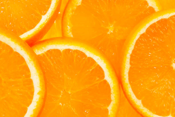 istock Close up of orange slices background 1141335431