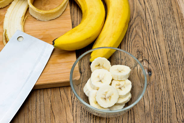 Flying banana slices, isolated on white background