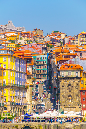 Porto, Portugal - February 16, 2023: Cityscape of traditional old buildings in the waterfront district.
