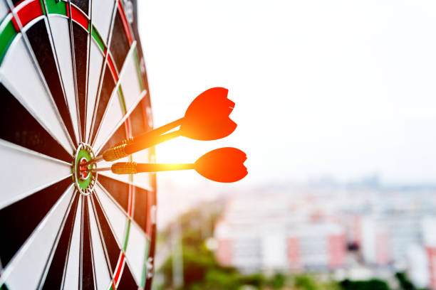 istock Dart board with three darts outdoors 1141338825