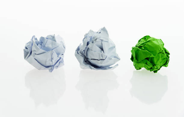 istock Green and white paper balls 1141340013