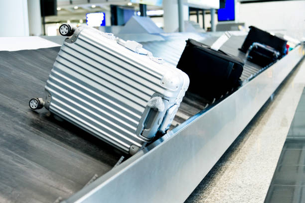 istock Suitcases on conveyor belt in the airport 1141341742