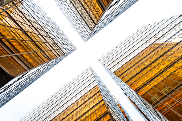 istock Looking up at golden skyscrapers 1141343447