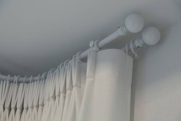 istock The white curtains with ring-top rail 1141350731