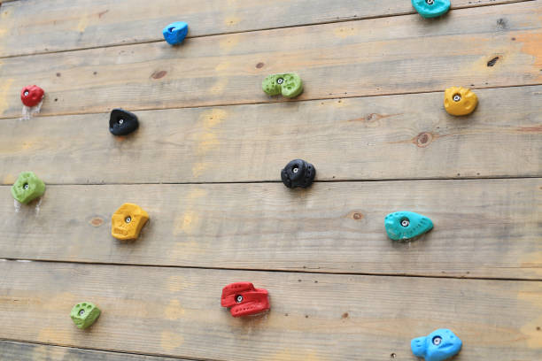 istock Rock climbing playground on wood wall. 1141357435