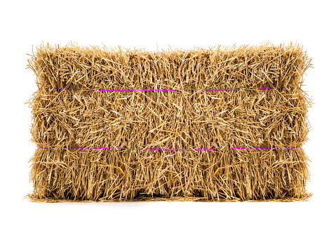 dry haystack isolated on white background