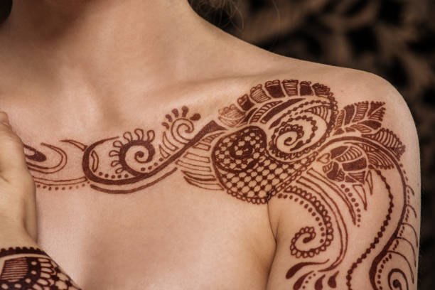 Henna Tattoo Close up of Henna Tattoo on shoulders theravada photos stock pictures, royalty-free photos & images