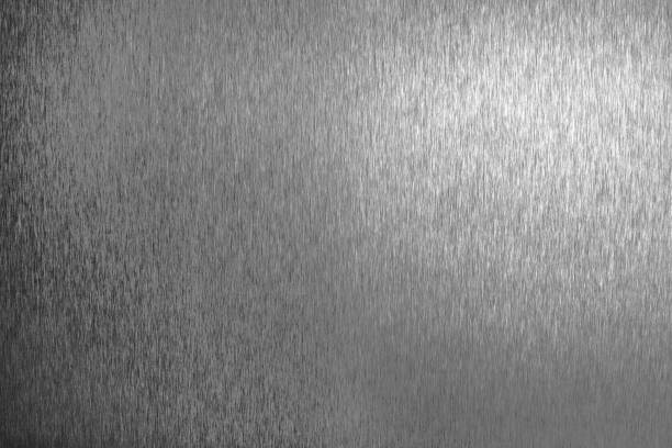 istock Silver metal shiny empty surface, monochrome shining metallic background, brushed black and white iron sheet backdrop close up, smooth dark gray steel texture, art grunge design element, copy space 1141372234