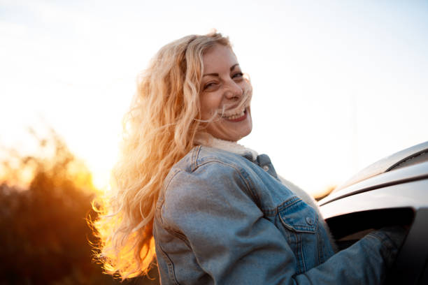 istock Happy woman on a road trip 1141373579